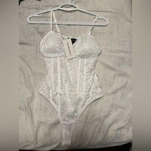 White laced bodysuit